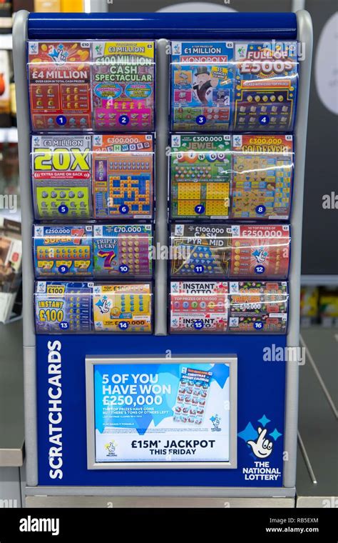 A National Lottery scratchcard retail display in a newsagent store in ...