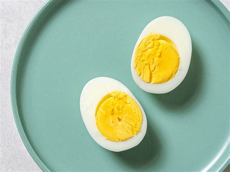 Download Two Boiled Eggs On A Plate | Wallpapers.com