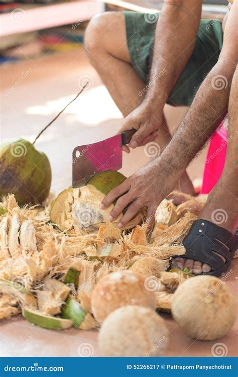 Chopping coconut by knife stock image. Image of chop - 52266217