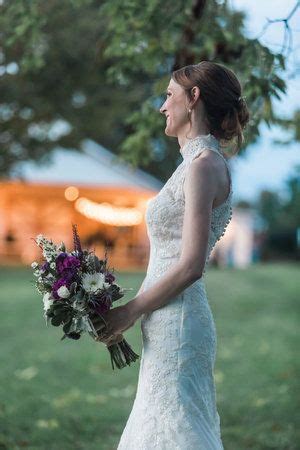 Bridal silhouette at Alldredge Orchards in Platte City, Missouri wedding. Purple, white and ...