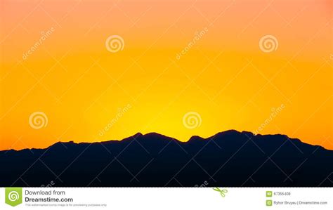 Dark Silhouette of Mountains on Yellow Sunrise Sky Background. S Stock Photo - Image of orange ...