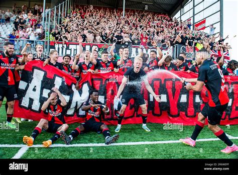 EMMEN - Almere City FC players celebrate promotion to the premier league 9m Almere City FC coach ...