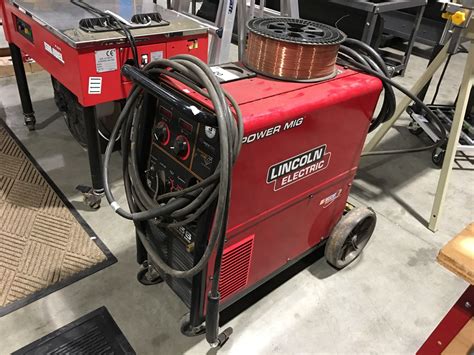 LINCOLN ELECTRIC 256 POWER MIG WELDER WITH SPOOL OF COPPER WIRE