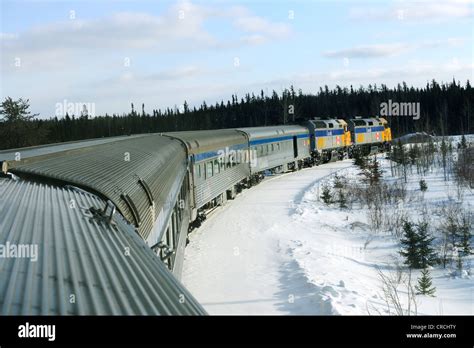 Train moving on the railway line between Winnipeg and Churchill, Manitoba, Canada Stock Photo ...