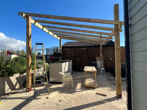 How to make a heavy duty wooden pergola that can support solar panels on a concrete base from ...