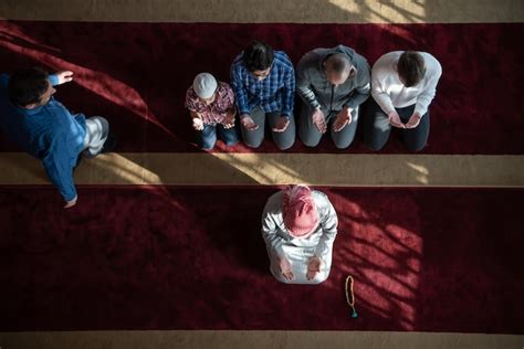 Premium Photo | Group of muslim people praying namaz in mosque.