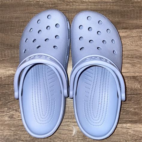 Light Blue Crocs Slightly used- still really good... - Depop