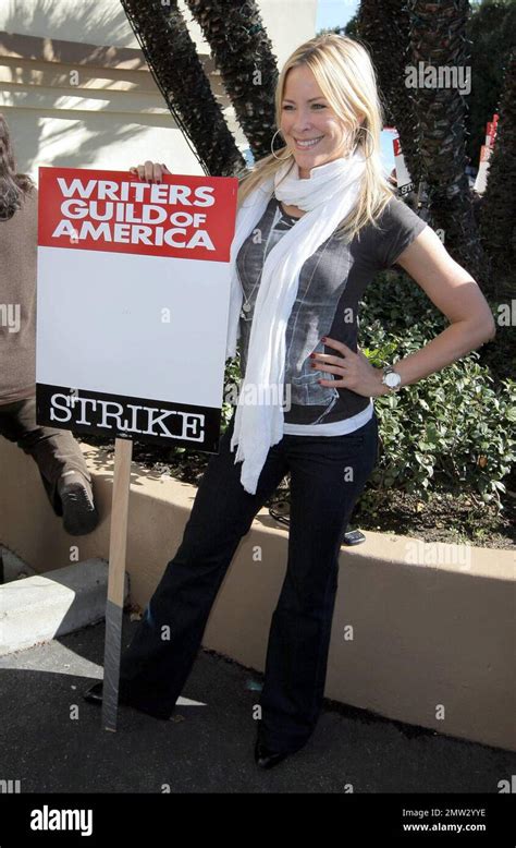 "The Game" stars Brittany Daniel and Coby Bell attend the WGA "Diversity Day" on the picket line ...