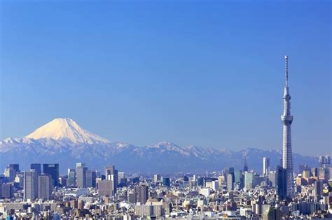 Mt Fuji looms over Tokyo. | Japan travel, Visit tokyo, Tokyo travel