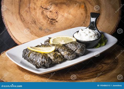 Greek Style Rice Wrapped in a Grapevine Leaf Stock Image - Image of gourmet, delicious: 195486515