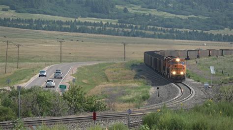 BNSF SD70MACe leading an all EMD coal train, BNSF SD70MAC on the rear plus, a BNSF and UP ...