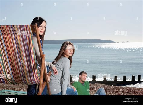 People relaxing on beach Stock Photo - Alamy