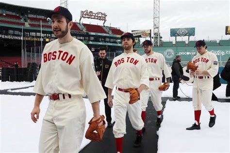 Bruins players wear vintage Red Sox uniforms before Winter Classic