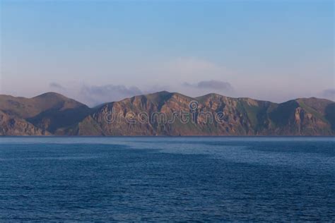 View on a Kunashir Island with Volcano Tyatya from the Sea Stock Image - Image of sunset, forest ...