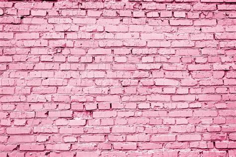 Premium Photo | Light pink brick wall background