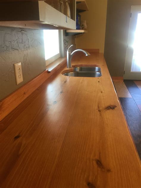 Kitchen DIY wooden countertop on s budget!! My new wood countertop my husband made. I absolutely ...