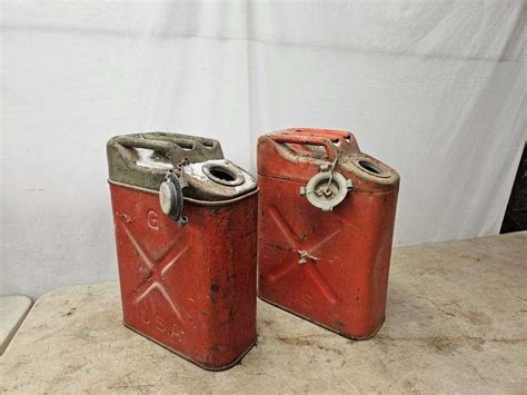 (2) USA Steel Gas Cans - Lee Real Estate & Auction Service