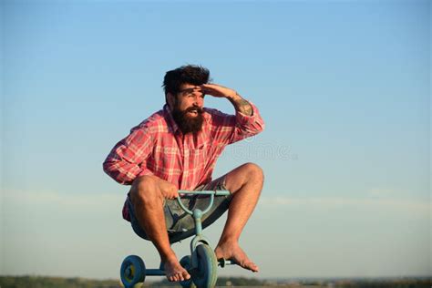 Crazy Man Riding a Small Bicycle. Funny Man Riding a Bike. Stock Photo - Image of happiness ...