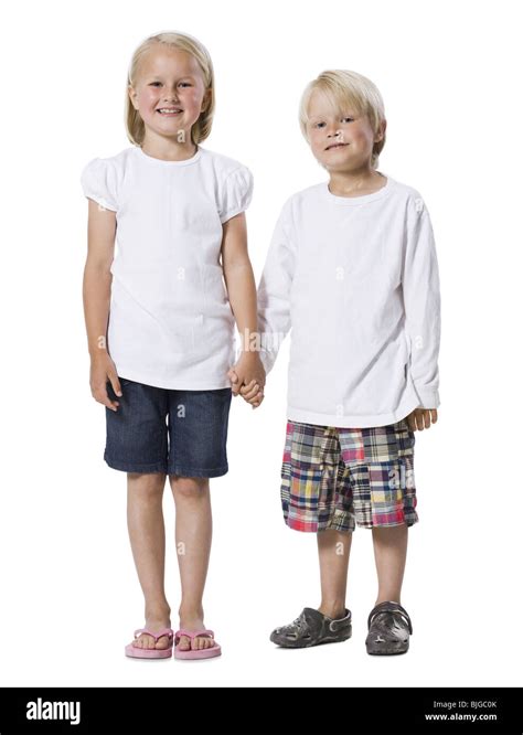 brother and sister holding hands Stock Photo - Alamy