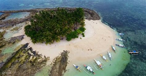 Siargao Islands: Daku, Guyam, and Naked Island Hopping Tour - Klook India