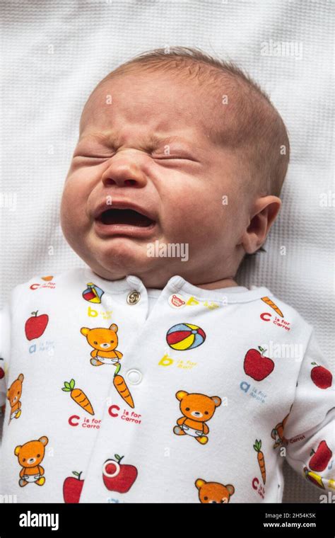 Newborn baby boy crying Stock Photo - Alamy