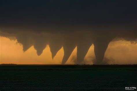 Digital composite image showing the developing stages of a tornado at ...