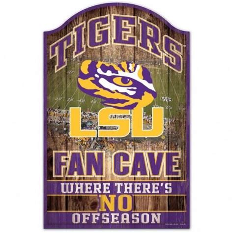 a wooden sign that reads lsu fans cave where there's no offseason