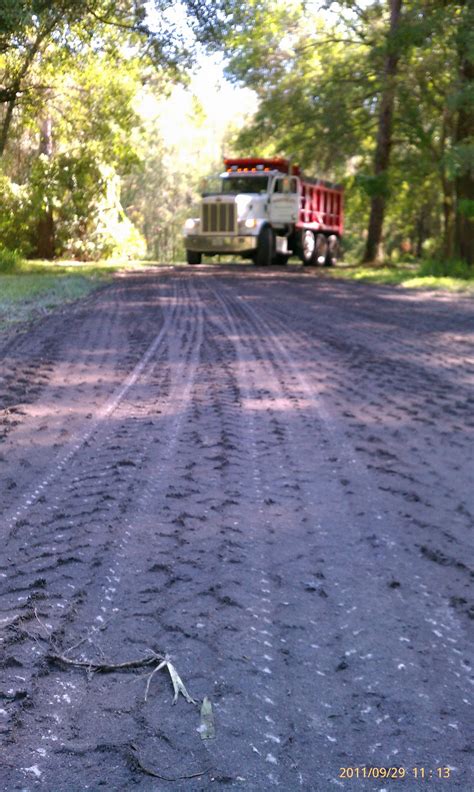 Just not Fill Dirt Anymore: Crushed Asphalt creates a great driveway...