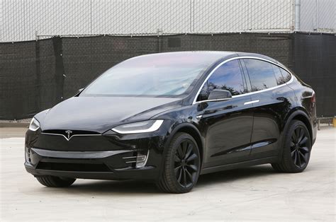 2016 Tesla Model X Debuts with 257-Mile Range, Falcon Doors