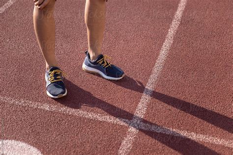 Shoes On Running Track Field | Stocksy United Feet Images, Running ...