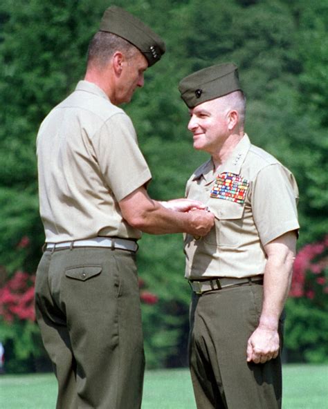 Commandant of the Marine Corps, General James L. Jones pins the ...