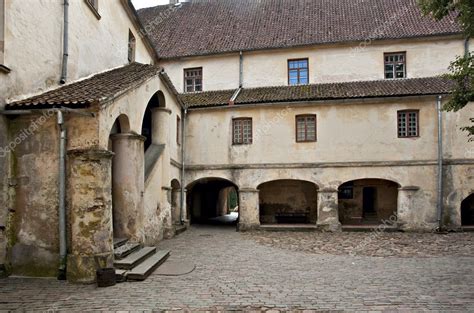 Medieval castle courtyard. — Stock Photo © MartinsL #6336892