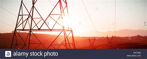 The evening electricity pylon silhouette Stock Photo - Alamy