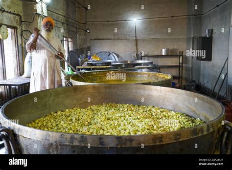 The Golden Temple (Sri Harmandir Sahib) Gurdwara kitchens for preparing ...