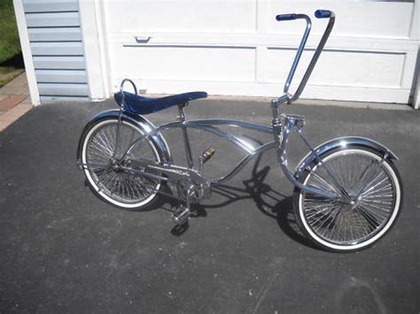 Chrome and blue lowrider bike in brint092's Garage Sale Louisville, KY