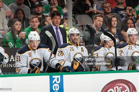 Ted Nolan, head coach of the Buffalo Sabres watches the action from ...