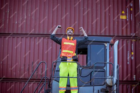 Premium Photo | Portrait team dock workers posing under working and ...