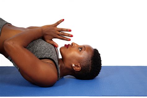 Beautiful Woman Doing Prayer Pose on Yoga Mat