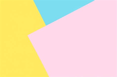 Premium Photo | Background of blue, pink, yellow papers. Geometric ...