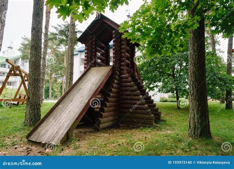 Children`s Playground. a Children`s Slide Made of Wood and Natural ...