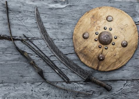 Premium Photo | Mongolian sword and leather shield of nomads