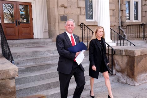 Clark County Sheriff Joe Lombardo leaves the Capitol Monday with his wife, Donna, after filing