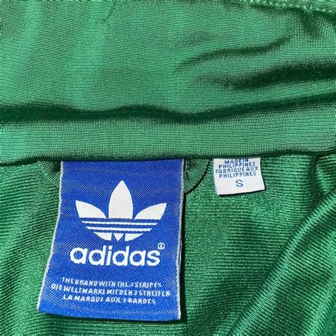 Vintage green adidas track jacket Worn a bit but... - Depop