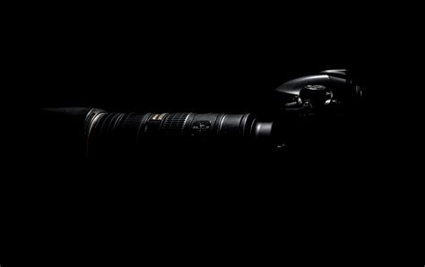 Black Dslr Camera on White Surface · Free Stock Photo