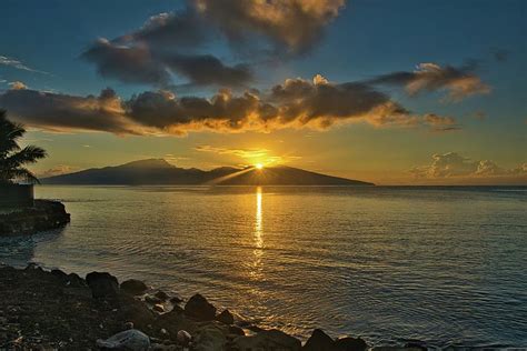 Sunrise Sun Star Over Tahiti Island Photograph by Heidi Fickinger