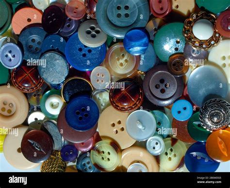 Various assorted colourful sewing clothing buttons Stock Photo - Alamy