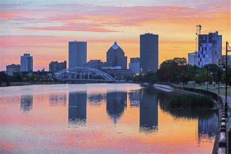 The Rochester Skyline at Sunrise Reflecting on the Genessee River Photograph by Toby McGuire ...