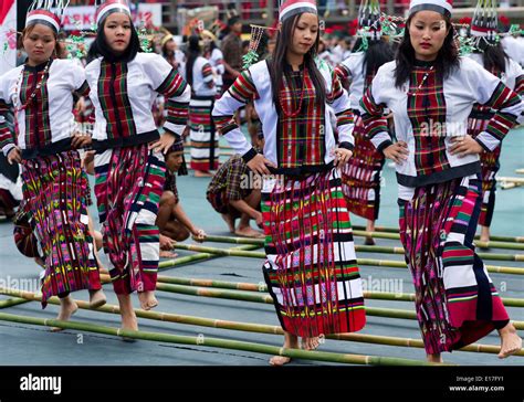 Portrait of Mizo tribe people at the Chapchar Kut festival wearing ...