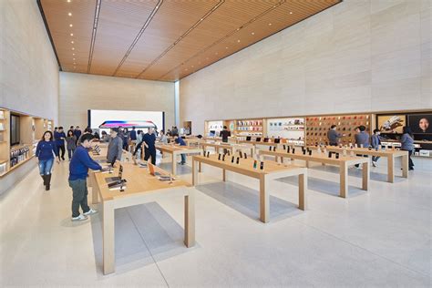 Apple requires masks and temperature checks as U.S. stores begin to ...