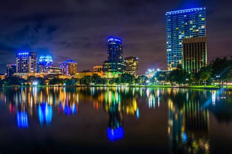 The Skyline Reflecting In Lake Eola At Night, Orlando, Florida. Stock ...